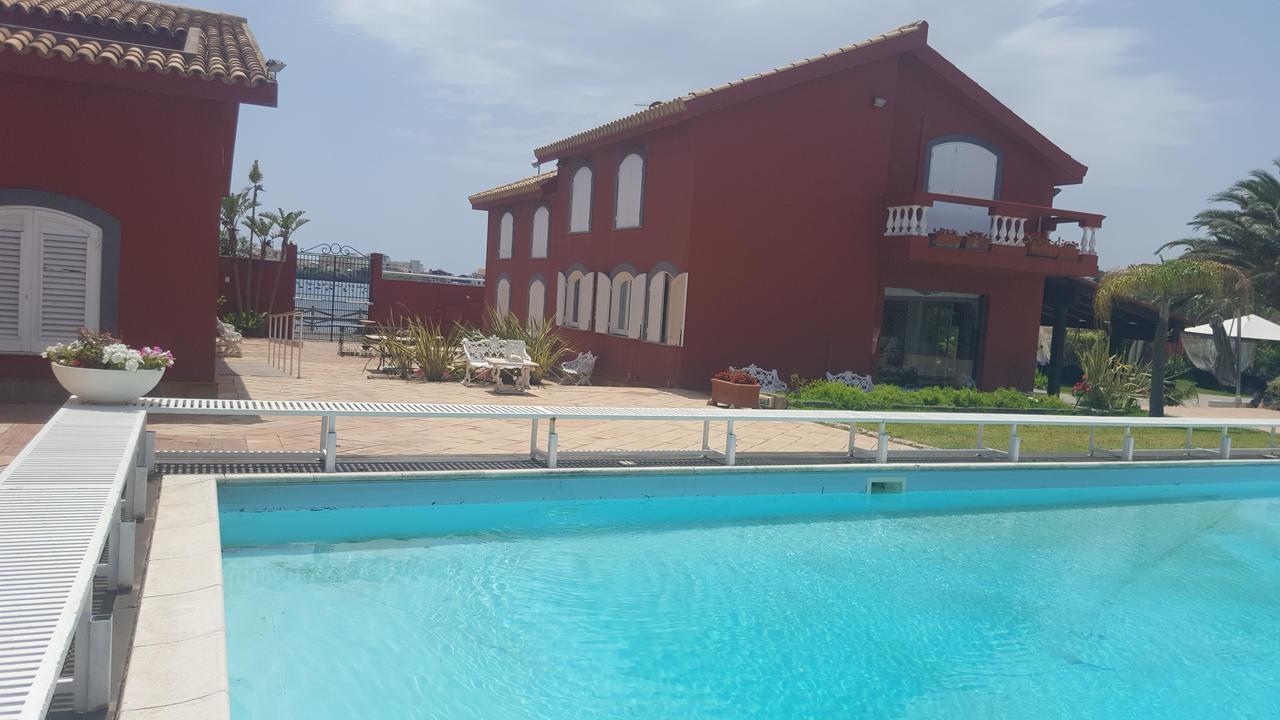 Bed and Breakfast I Giardini Di Giano Торре-Фаро Экстерьер фото